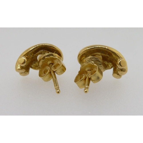 294 - An 18 carat gold pair of earrings, total weight 4g