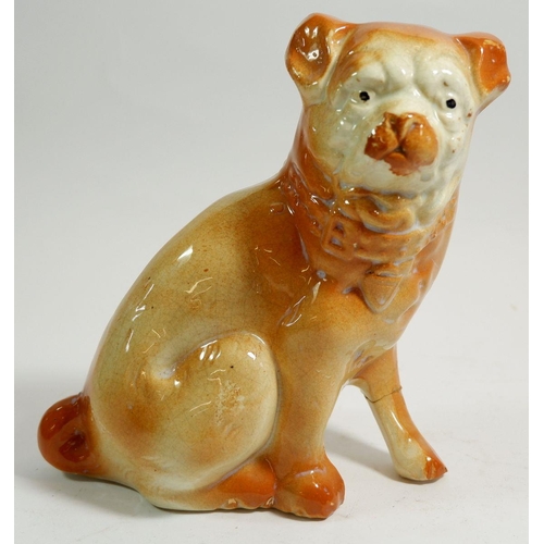 33 - A Victorian Stafforshire pug dog (repaired) 17cm tall