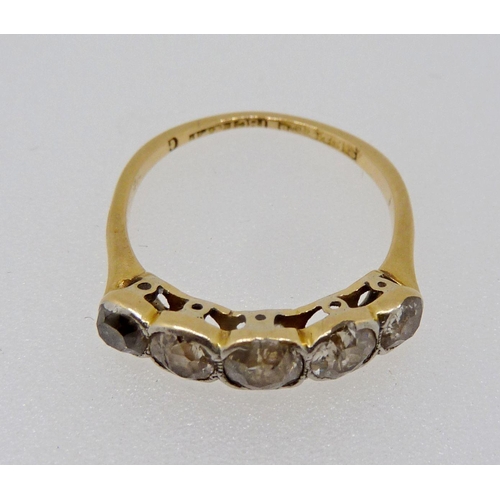 348 - An Edwardian 18 carat gold ring set five diamonds, size J