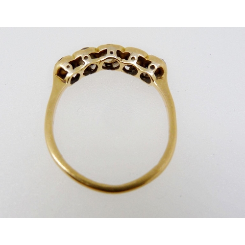 348 - An Edwardian 18 carat gold ring set five diamonds, size J