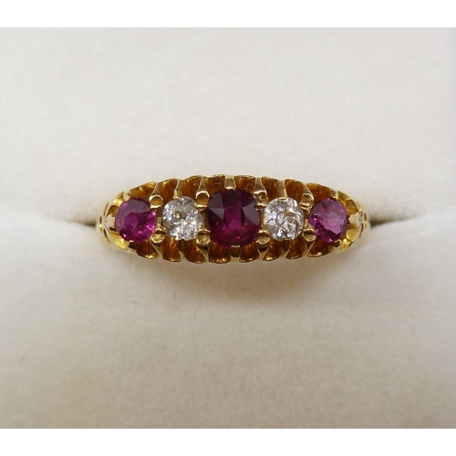 360 - An 18 carat gold ring set three rubies and two diamonds, size O to P