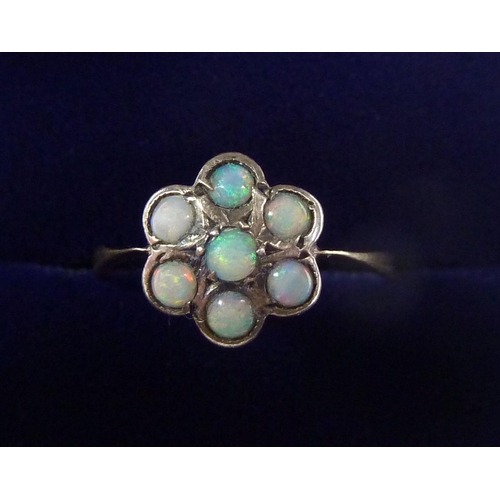 364 - A silver and 9 carat gold opal cluster ring, size L