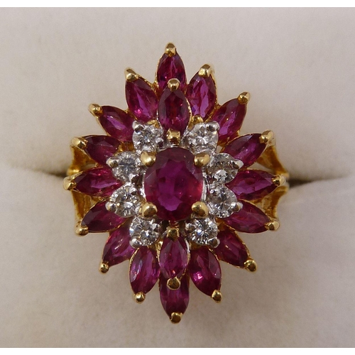 370 - An 18 carat gold three tier ruby and diamond cluster ring, size K-L, 5.6g