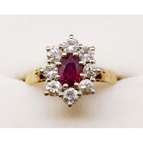 375 - An 18ct gold ruby and diamond cluster ring, size N