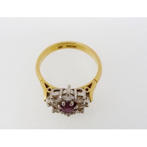 375 - An 18ct gold ruby and diamond cluster ring, size N