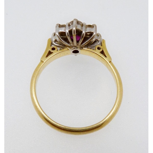 375 - An 18ct gold ruby and diamond cluster ring, size N