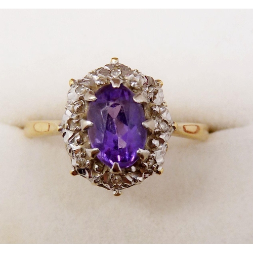 376 - An 18ct gold amethyst and diamond cluster ring, size S to T, 3.7g