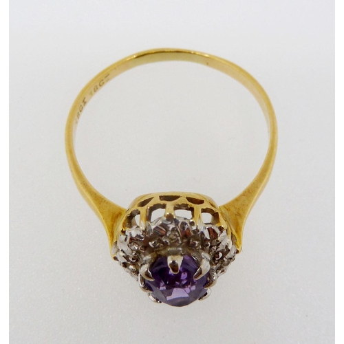 376 - An 18ct gold amethyst and diamond cluster ring, size S to T, 3.7g