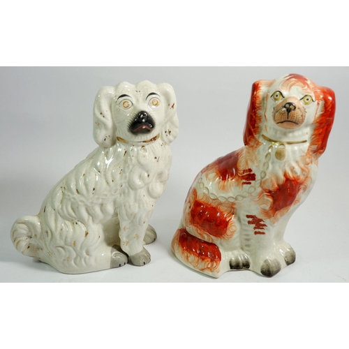 38 - Two Victorian Staffordshire dogs, largest 23cm