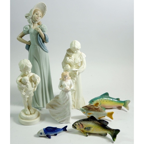 42 - A group of four china figures, including Nao Royal Doulton and Royal Worcester and four china fish