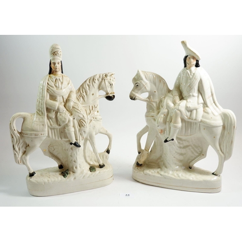 44 - A pair of Victorian Staffordshire equestrian figures 16cm tall