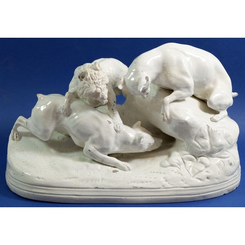 5 - A Victorian white pottery group of three hunting dogs, 31cm wide, a/f