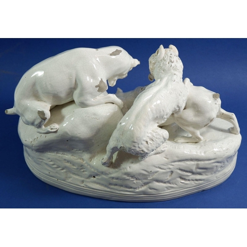 5 - A Victorian white pottery group of three hunting dogs, 31cm wide, a/f