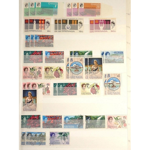 524 - Grenada/Grenadines: Boxed collection of 4 stock-books of mint/used defin & commem; KGVI/QEII, mostly... 