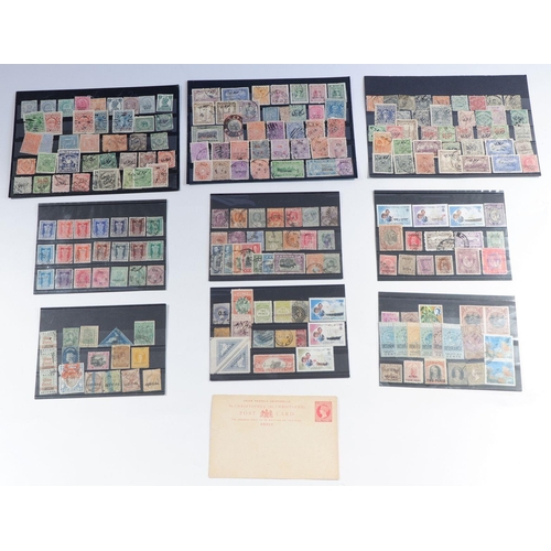 680 - Br Empire: Sleeve of 9 stock cards of mint/used defin, commem, official, fiscals & unused PC. Much f... 