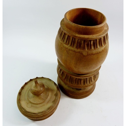 772 - A large turned wood pot and cover, 40cm tall