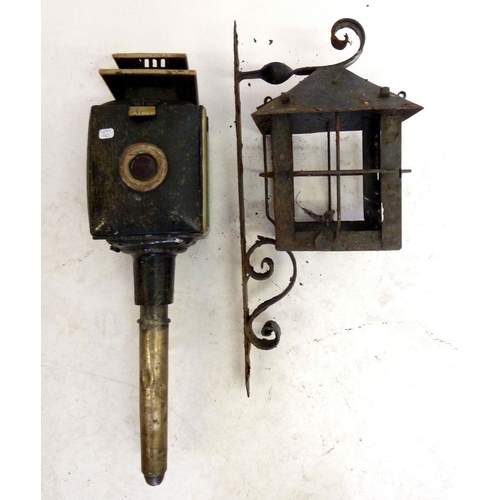 792 - A cast iron wall lantern and a carriage lamp