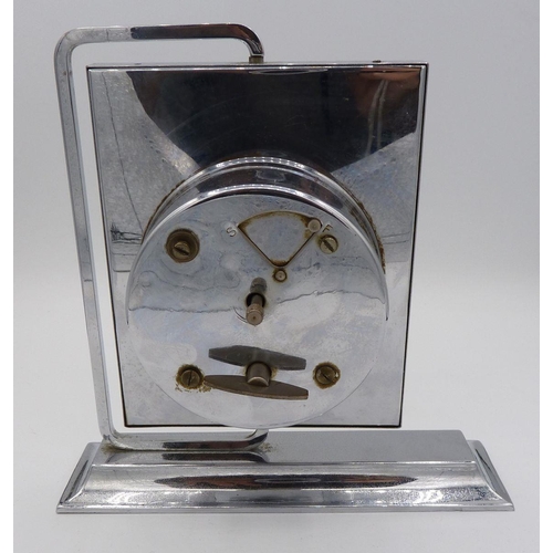 795 - A Perival Art Deco chrome clock suspended on angular stand, 17cm