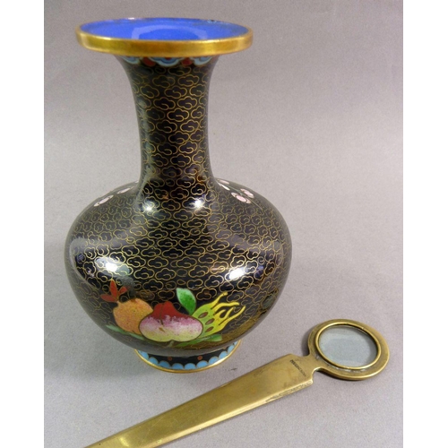 844 - A Chinese brass paperknife with integral magnifying glass and an enamel vase