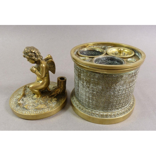 849 - A 19th century brass inkwell with cherub to lid, 14cm