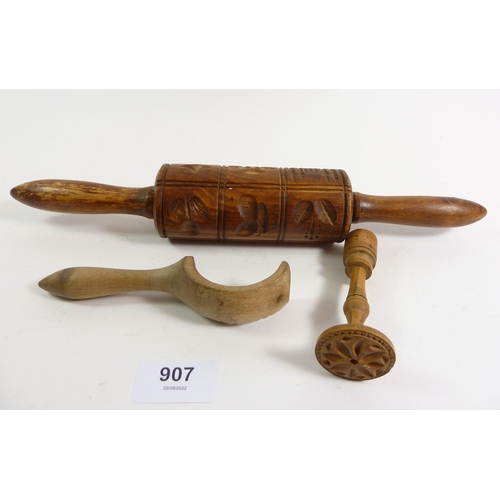 907 - A Victorian wooden biscuit mould rolling pin, a butter curler and a butter stamp