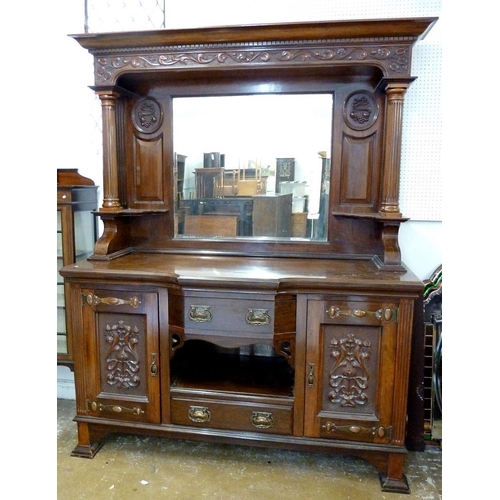 919 - An Edwardian Art Nouveau mahogany mirror back sideboard with carved decoration on reeded columns, wi... 