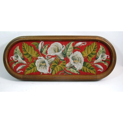 932 - A Victorian oval inlaid stand inset with original lily beadwork, 55 x 21.5cm