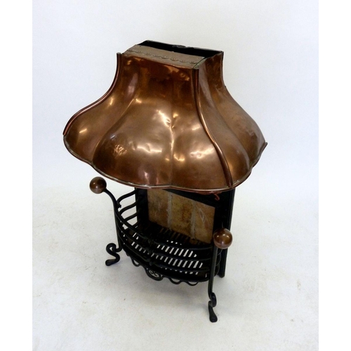 956 - An Art Nouveau copper and cast iron fire grate with embossed decoration to copper hood, 104 x 62cm