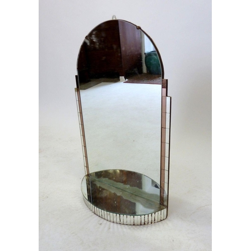 965 - An arch top Art Deco mirror with pink glass stepped sides and plinth base, 66 x 40cm