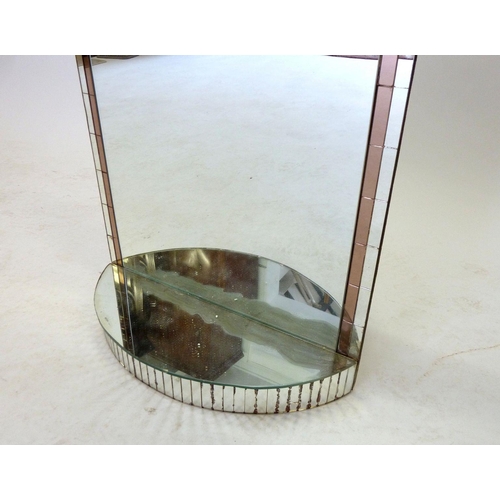 965 - An arch top Art Deco mirror with pink glass stepped sides and plinth base, 66 x 40cm