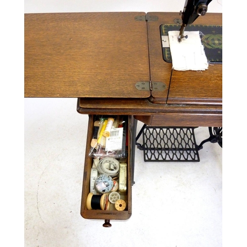 966 - A Singer treddle sewing machine