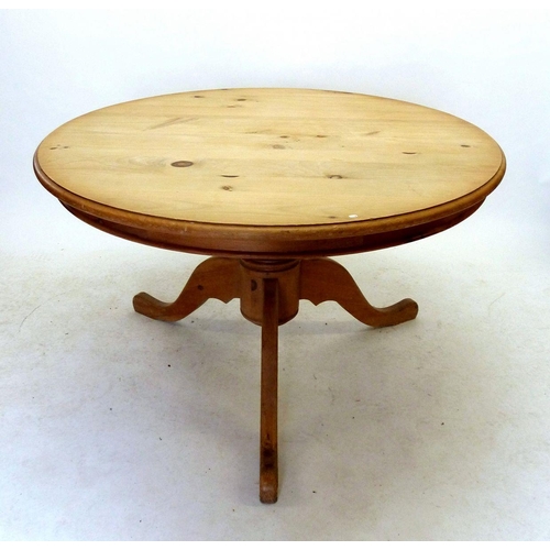 971 - A pine circular small breakfast table on turned column and triple supports, 109cm diameter