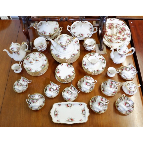 98 - A Royal Albert Celebration tea and dinner service comprising meat plate, cake stand, two sandwich pl... 