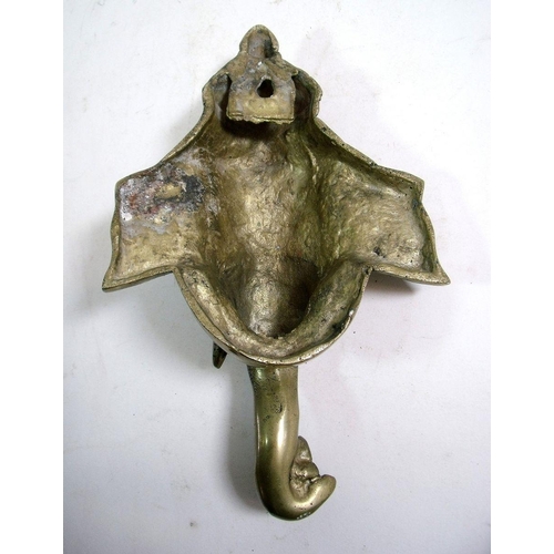 998 - An Indian brass elephant head wall plaque 23cm tall