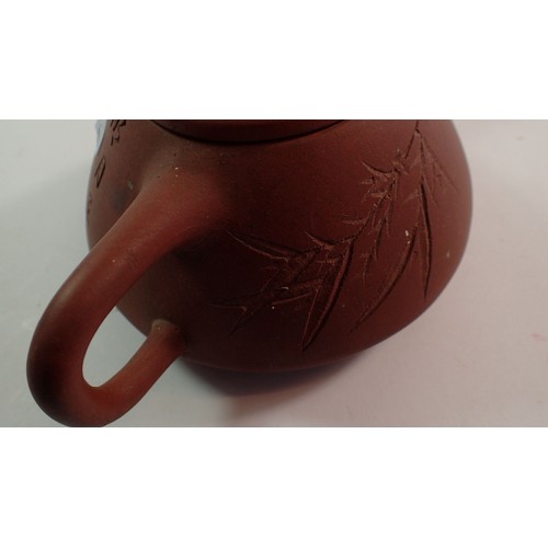 137 - A Japanese red stoneware teapot