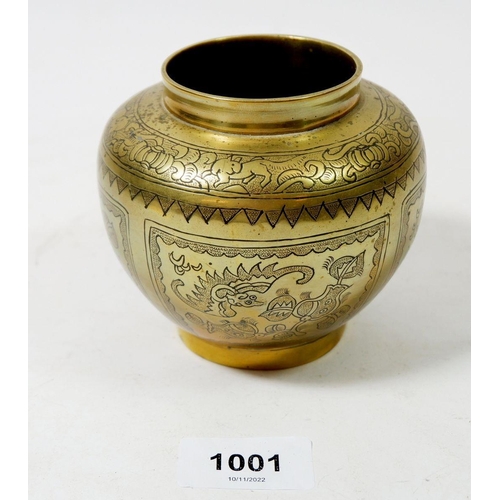 1001 - A Chinese 20th century brass incense burner engraved traditional good fortune decoration within pane... 