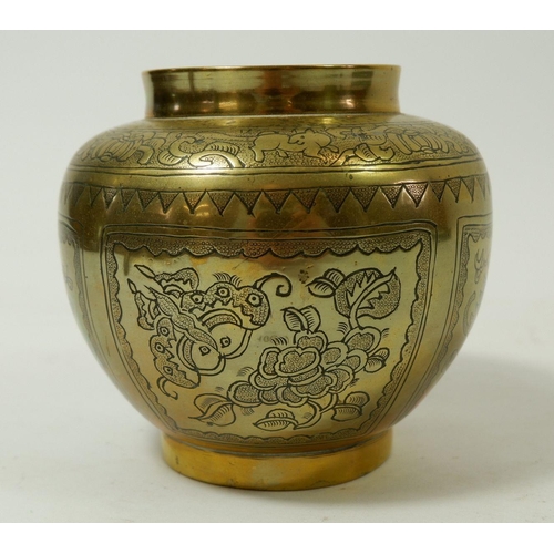 1001 - A Chinese 20th century brass incense burner engraved traditional good fortune decoration within pane... 