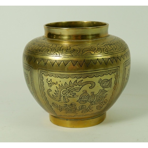 1001 - A Chinese 20th century brass incense burner engraved traditional good fortune decoration within pane... 