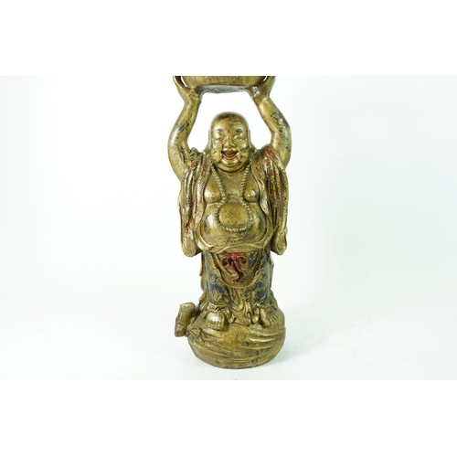 1003 - A Chinese painted metal Buddha holding basket aloft, 30.5cm