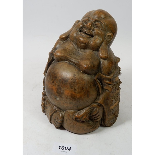 1004 - An early 20th century bamboo root carving of laughing Budha, 18cm tall