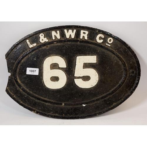 1007 - An antique oval cast iron railway bridge sign for London and North West Railway Co, a/f - 45cm wide