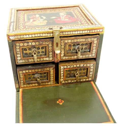 1042 - An Indian painted wooden box with figures to top and sides, the drop front enclosing drawers, 18cm w... 