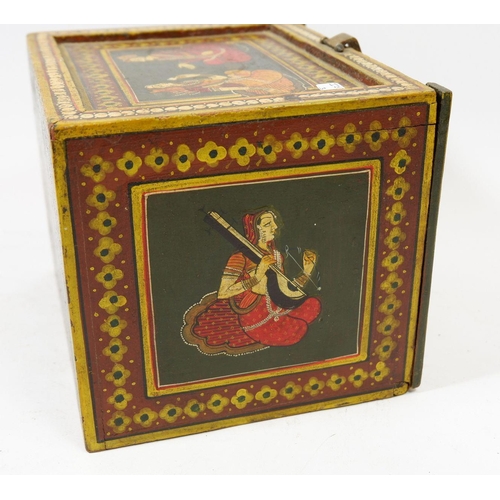 1042 - An Indian painted wooden box with figures to top and sides, the drop front enclosing drawers, 18cm w... 