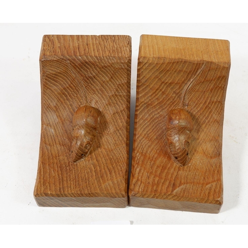 1065 - A pair of Mouseman (Robert Thompson) carved oak bookends, 15cm tall