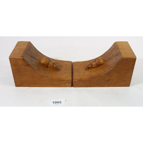 1065 - A pair of Mouseman (Robert Thompson) carved oak bookends, 15cm tall