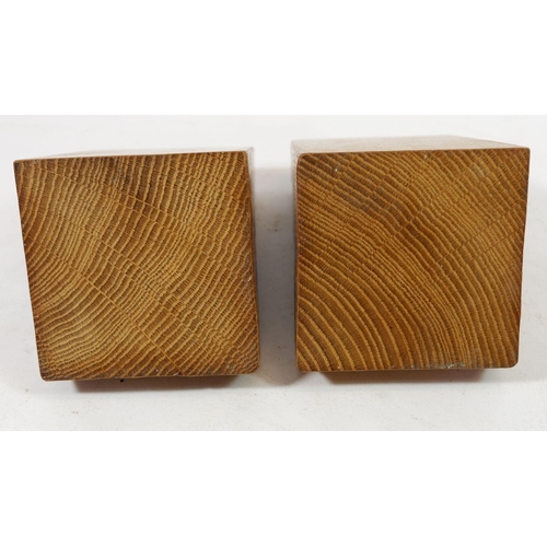 1065 - A pair of Mouseman (Robert Thompson) carved oak bookends, 15cm tall