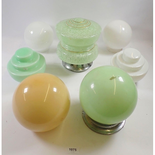 1075 - A collection of seven vintage glass light shades and globes plus one other