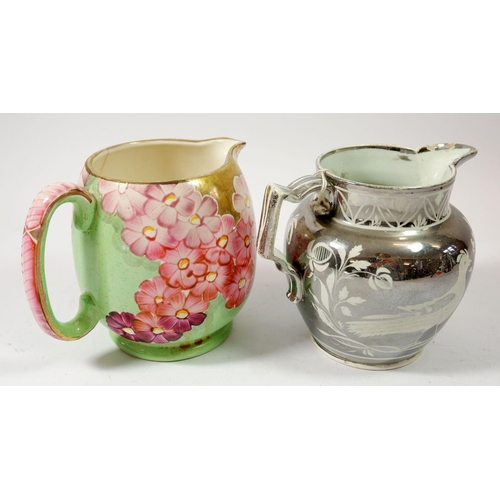 107A - Two 1930's floral jugs