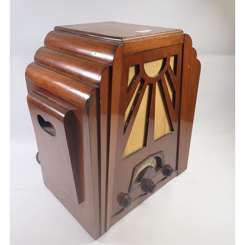 1175 - A Consoldiated Radio in walnut case with sunray design, 36.5 x 44.5cm x 24cm deep