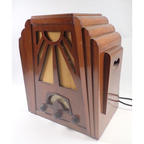 1175 - A Consoldiated Radio in walnut case with sunray design, 36.5 x 44.5cm x 24cm deep